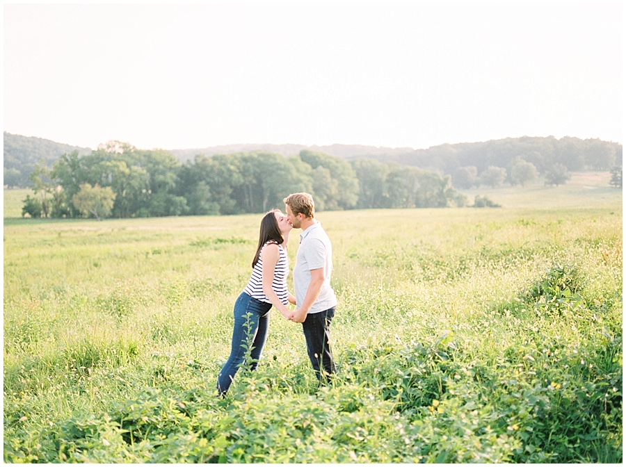 Summer, Valley Forge Pennylvania engagement session with green fields and a stunning golden hour by film photographer Hillary Muelleck