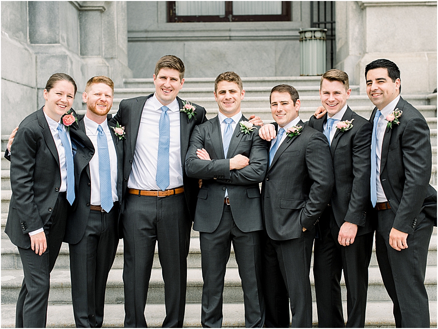 Groomsmen with dark grey suits and blue ties at Pennsylvania State Capitol Wedding