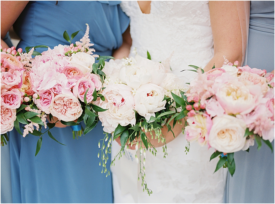 Bridesmaids with Dusty Blue dresses at peony bouquets at Pennsylvania State Capitol Wedding