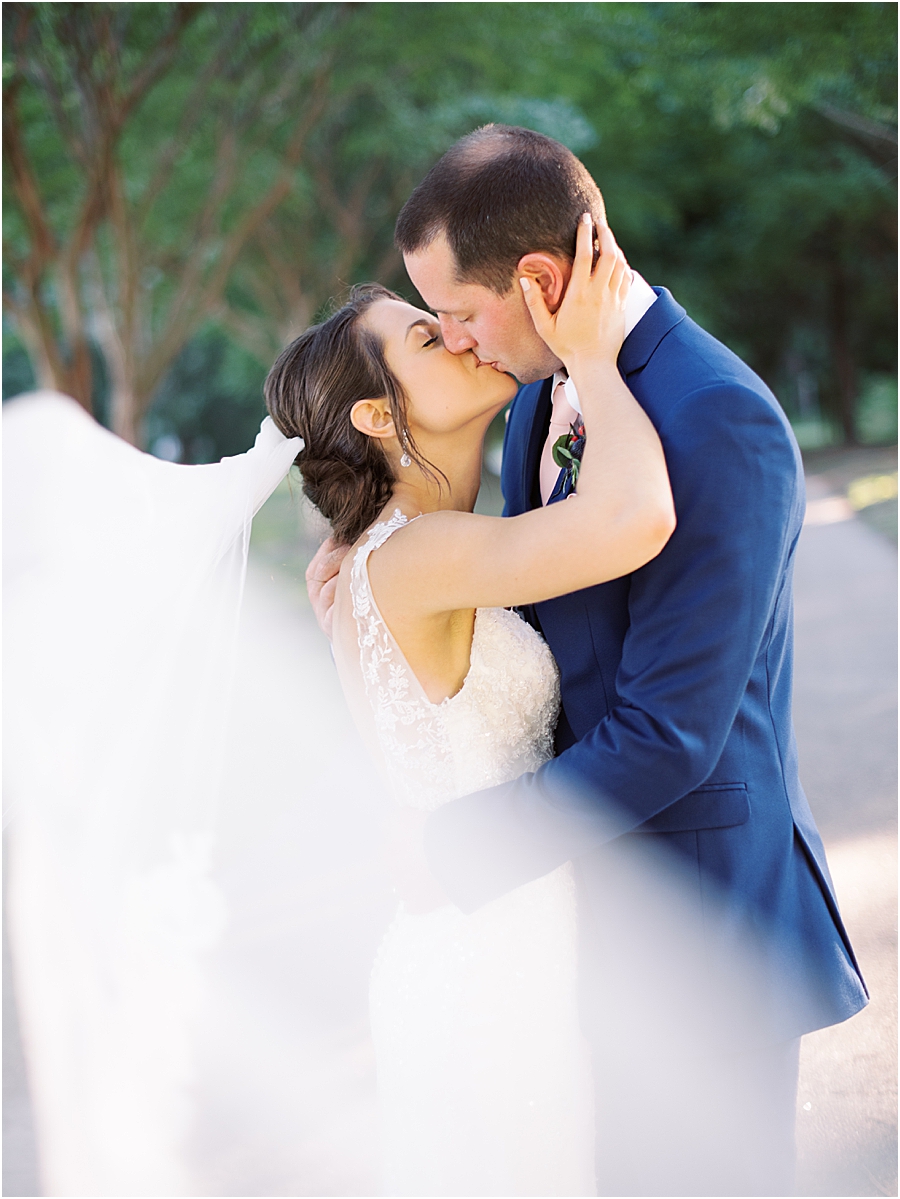 Bride and Groom with Cathedral Veil | Rustic Raleigh North Carolina Wedding at Walnut Hill